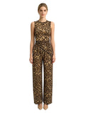 Woman's leopard print two-piece ensemble features a round-neck, sleeveless, irregularly cropped vest paired with flared, wide-leg trousers, presenting an elegant combination suitable for both streetwear and club attire